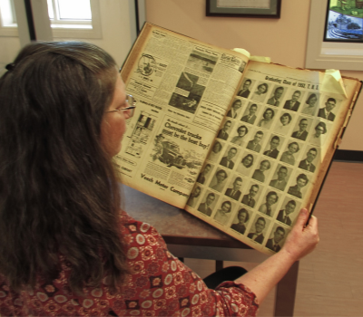 Patron looking at newspaper archives