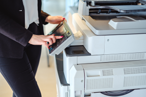 Woman at printer