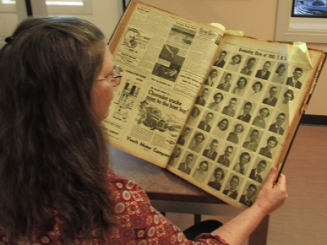 Patron looking at newspaper archives