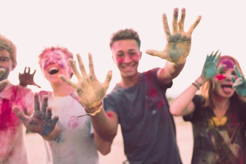 Teens with painted hands