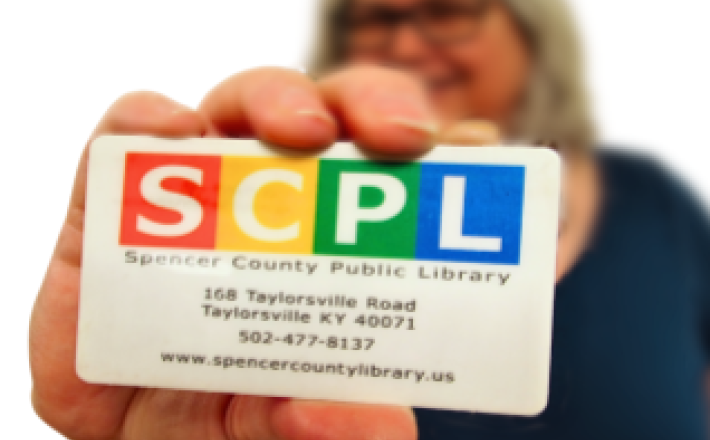 Woman holding SCPL library card